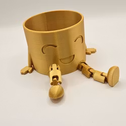 Kruka med ben och glad min – 7 cm