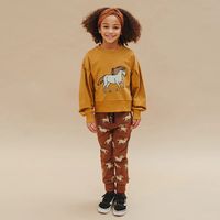 Joggingbyxor baby/barn – Bruna med vilda hästar | Ekologisk bomull 62-152cl
