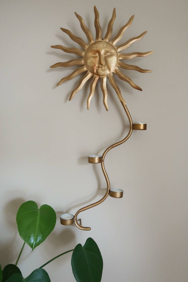 Sol väggljusstake