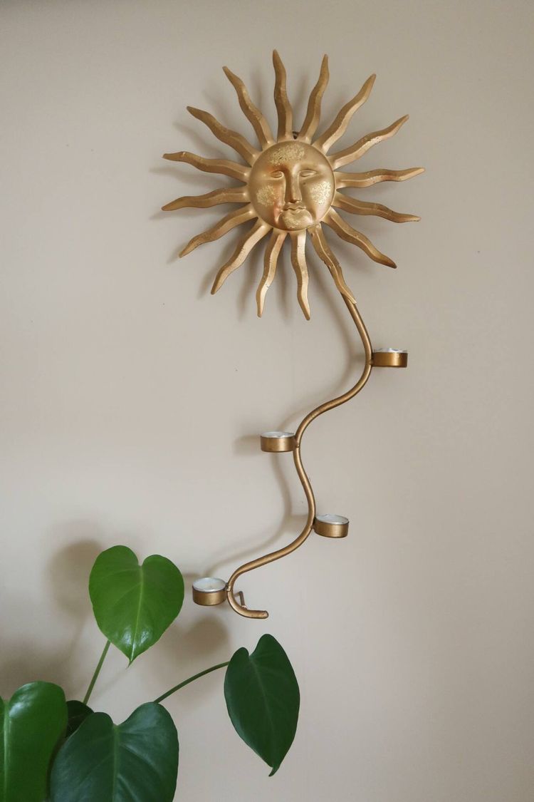 Sol väggljusstake