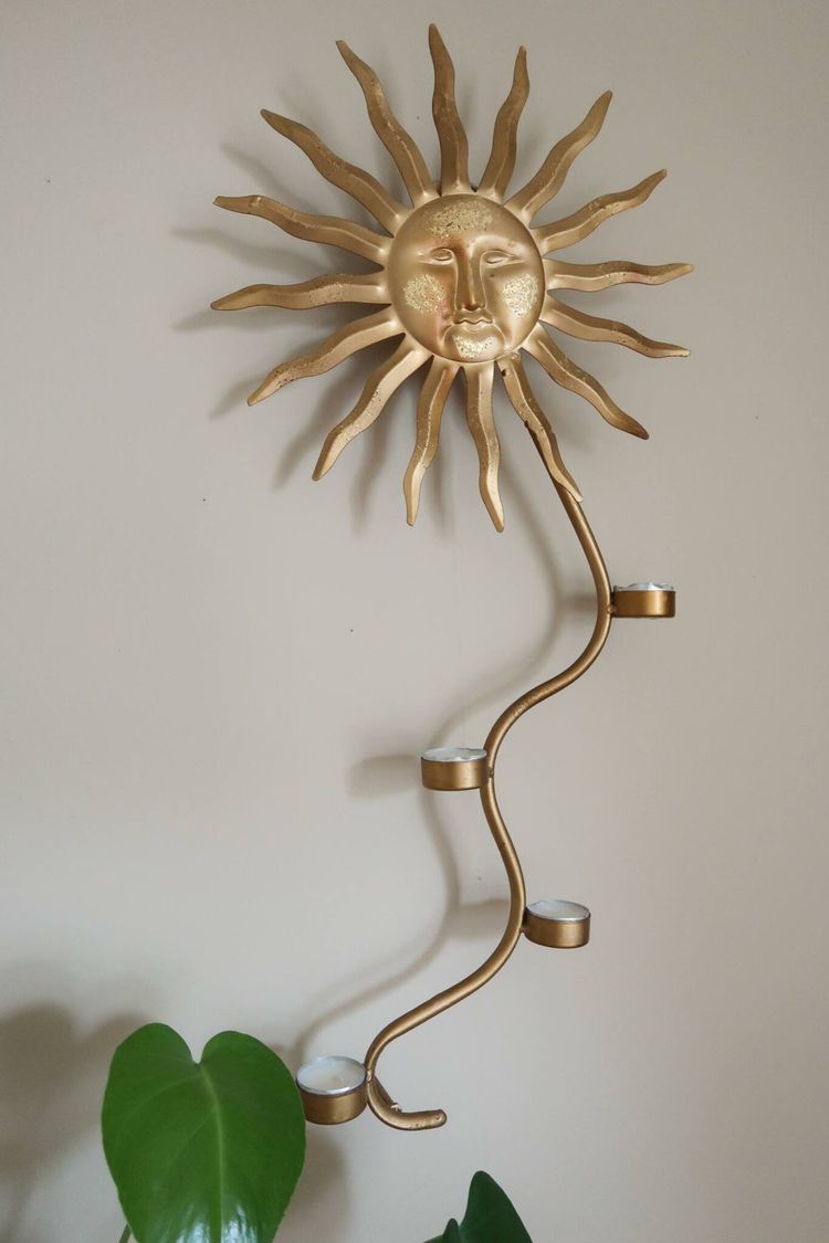 Sol väggljusstake