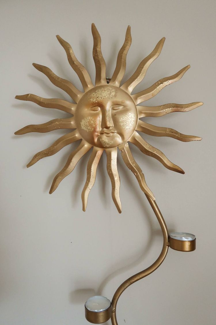 Sol väggljusstake
