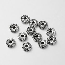 Mellandel, Rondeller, 7x2mm, 25st