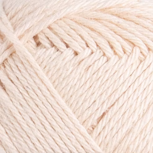 Närbild på Nova Eko 233 Peachy – kulör och struktur i omerceriserad bomull