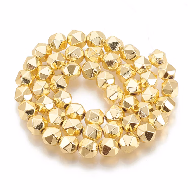 Guldfärgad hematit 5-6 mm star cut, 10 st