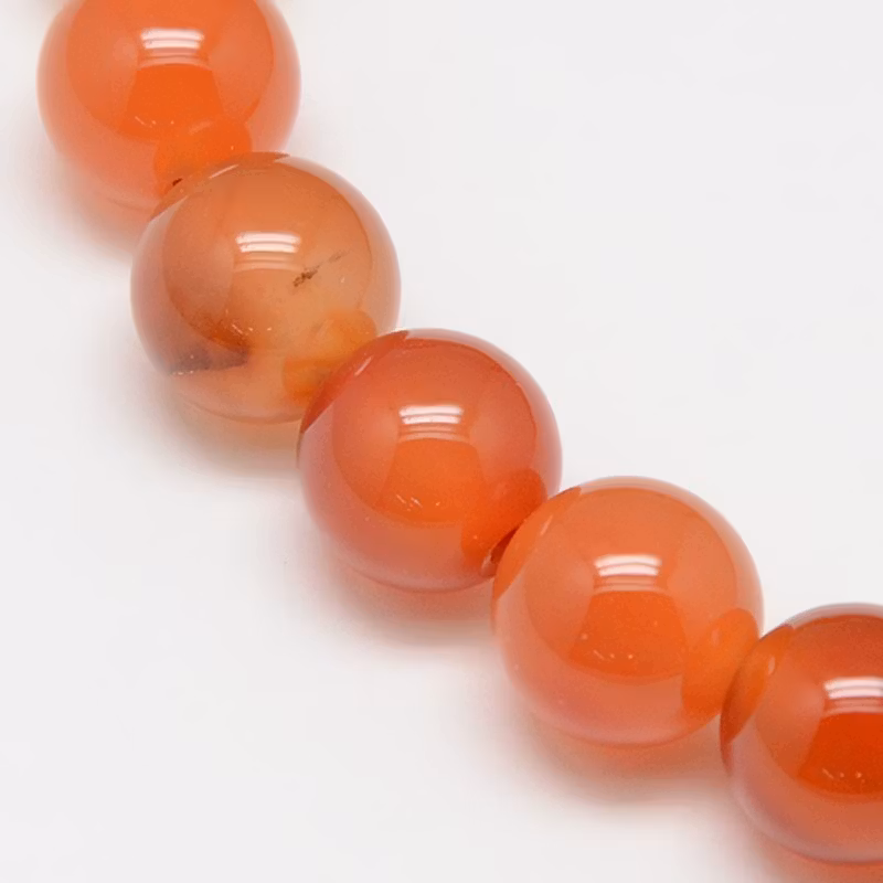 Melerad karneol 4 mm, 1 sträng