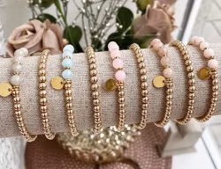 Guldfärgat rostfritt stål rund tag 8 mm med PVD plätering, 10 st