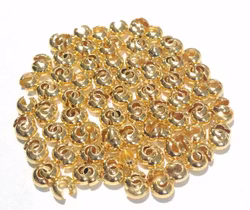 Guldfärgade knutgömmor 6 mm, ca 50 st