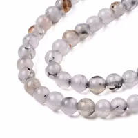 Agat ljusgråmelerad 6 mm, 1 sträng