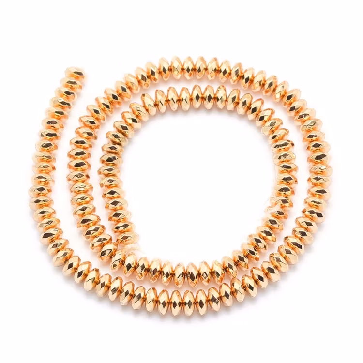 Ljust guldfärgad hematit facetterade rondeller 6x3 mm, 1 sträng