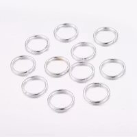 Silverfärgat rostfritt stål bindringar 4 mm, ca 200 st