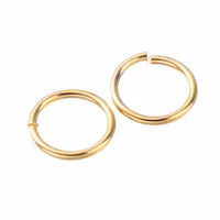 Guldfärgat rostfritt stål bindringar 4 mm med 18k plätering, ca 1000 st