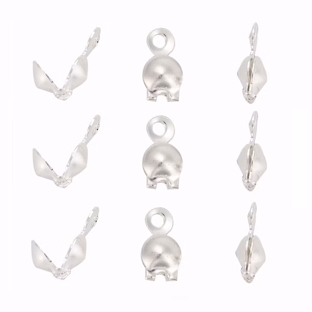 Silverfärgat rostfritt stål knutgömmor 4 mm med öglor, ca 200 st