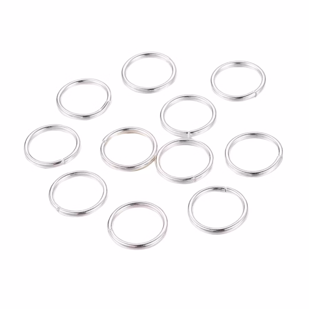 Silverfärgat rostfritt stål bindringar 4 mm, ca 100 st