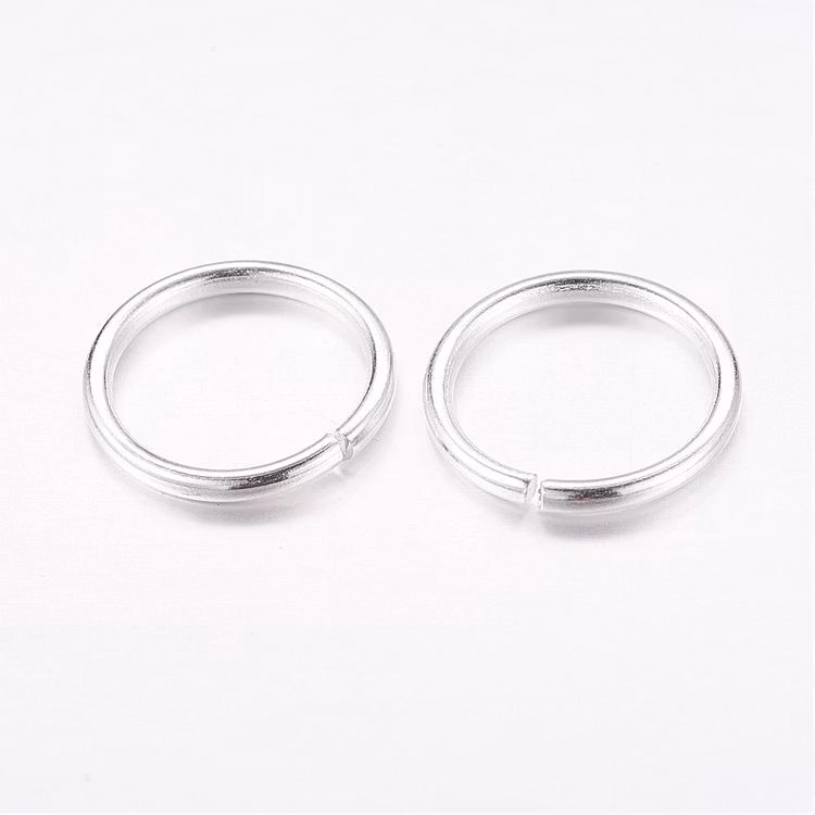 Silverfärgat rostfritt stål bindringar 6 mm, ca 100 st