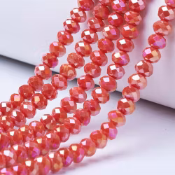 Facetterade abacus 6x4 mm röda glittriga, 1 sträng