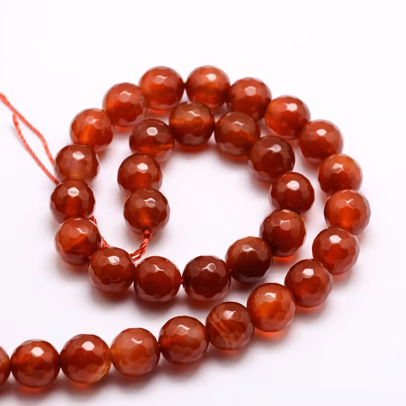 Facetterad karneol 2.5 mm, 1 sträng