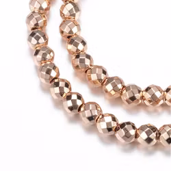 Ljust guldfärgad hematit facetterade 8 mm, 1 sträng