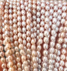 Freshwater pearls 4x5 mm misty pink, 1 strand