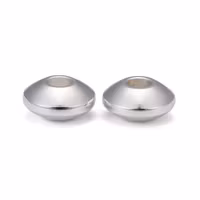 Storpack: Silverfärgat rostfritt stål slipade rondeller 7 mm, ca 50 st