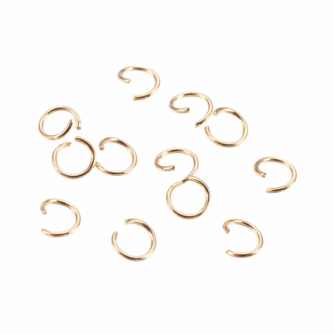 Gold-colored stainless steel binding rings 3 mm, approx. 100 pcs.