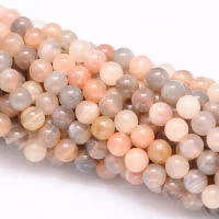 Månsten peach melerad 4 mm, 1 sträng