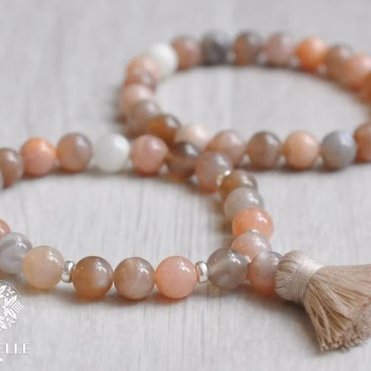 Månsten peach melerad 4 mm, 1 sträng