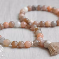 Månsten peach melerad 4 mm, 1 sträng