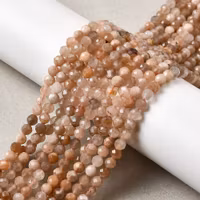 Facetterad månsten peach 3 mm, 1 sträng