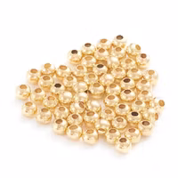 REA: Guldfärgat rostfritt stål pärlor 2.5 mm med 18k plätering, ca 500 st
