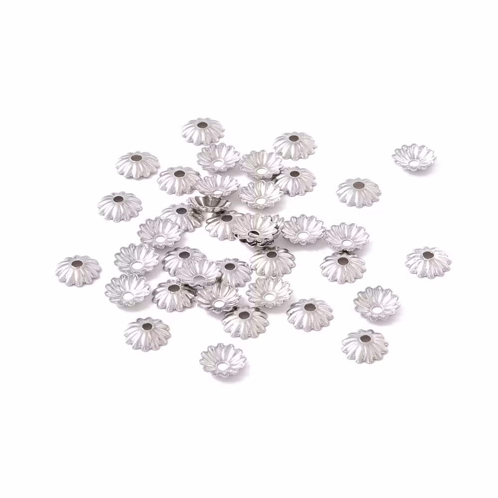 Surgical steel bead caps grooved 6 mm, approx. 100 pcs.