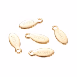 Gold-colored surgical steel small tags with text 24k, 10 pcs