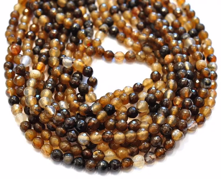 Facetterad agat 6 mm brunmelerad, 1 sträng