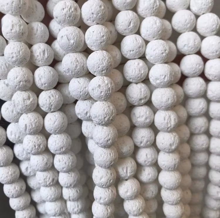 Vita lavapärlor 8 mm, 1 sträng