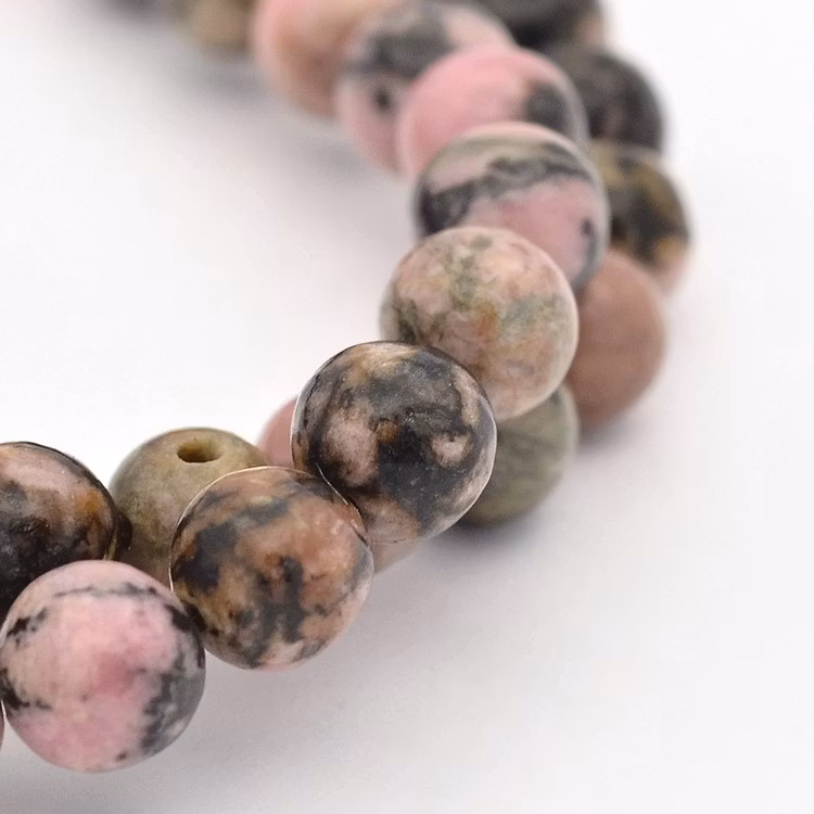 REA: Rodonit rosa/svartmelerad 4 mm, 1 sträng