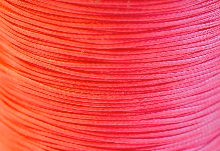 Vaxad bomullstråd 0.5 mm korall, 5 m
