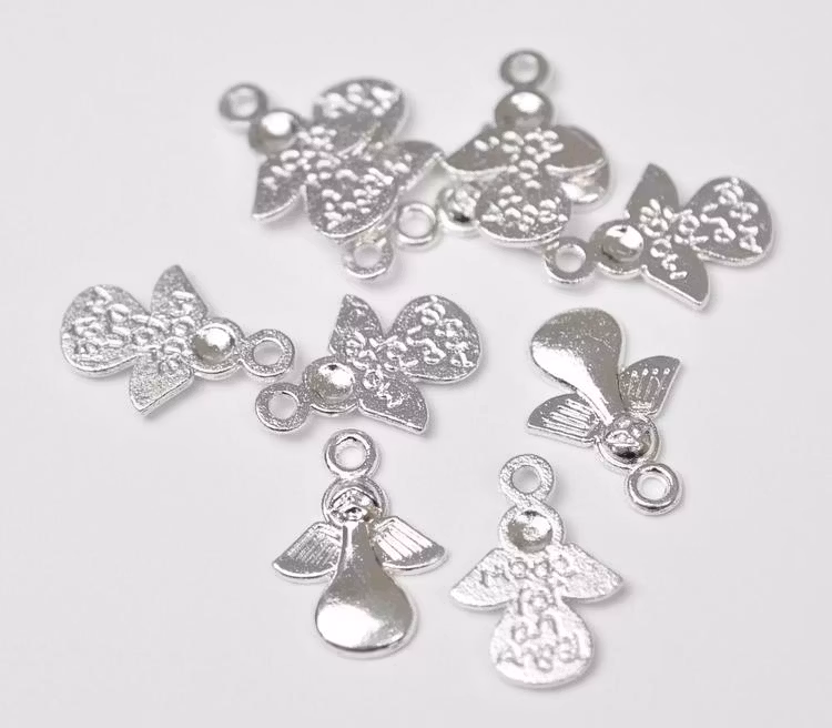 REA: Silverfärgade berlocker Made for an angel, ca 100 st