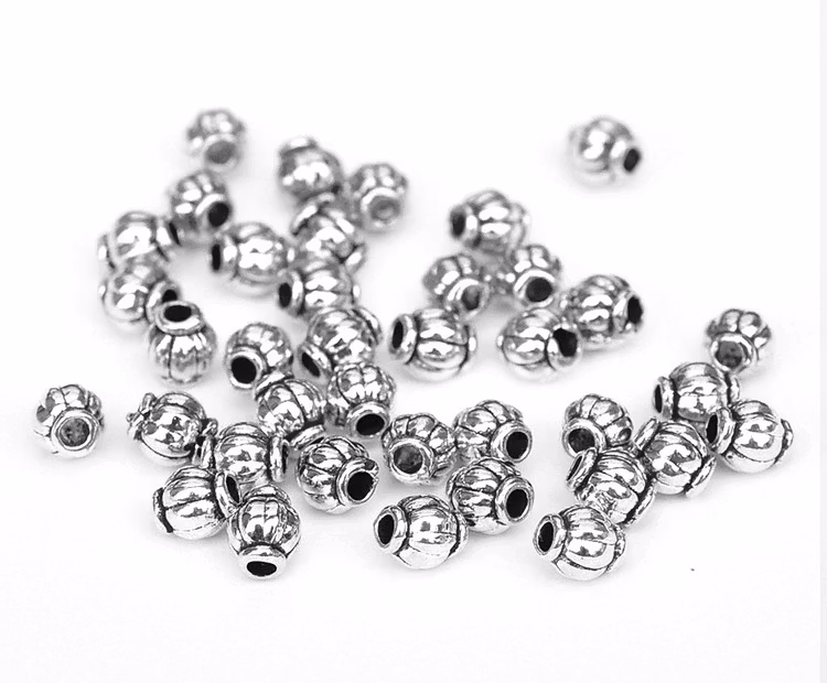 Antikfärgade mönstrade minitunnor, ca 100 st