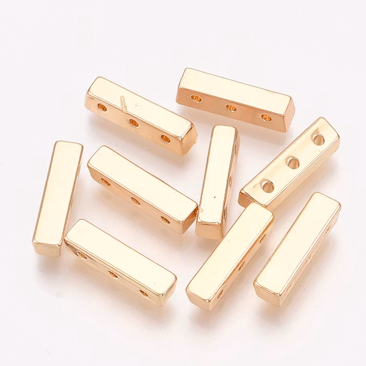 Guldfärgad slät mellandel 3 hål, 1 st