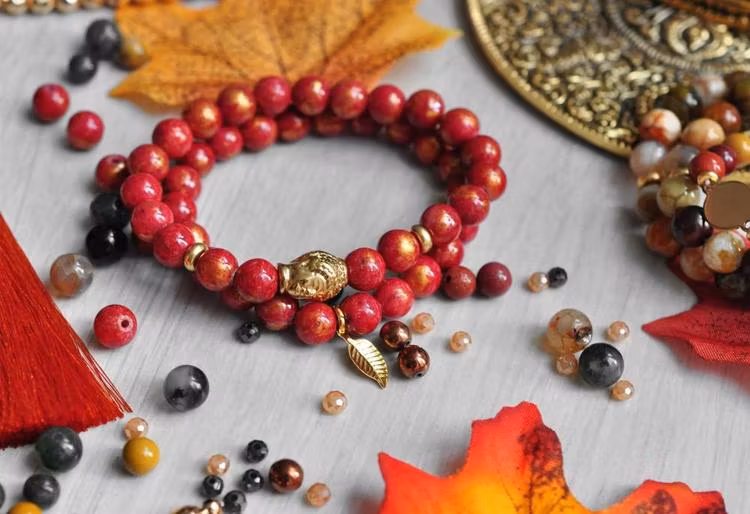 Guldfärgat rostfritt stål berlocker små löv, 10 st