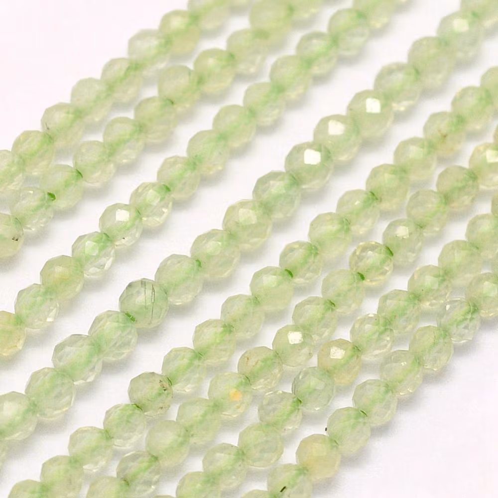 Facetterad prehnit 1.5-2 mm, 1 sträng