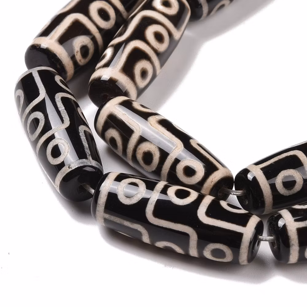 Tibetansk DZI avlång bumling svart och beige, 1 st