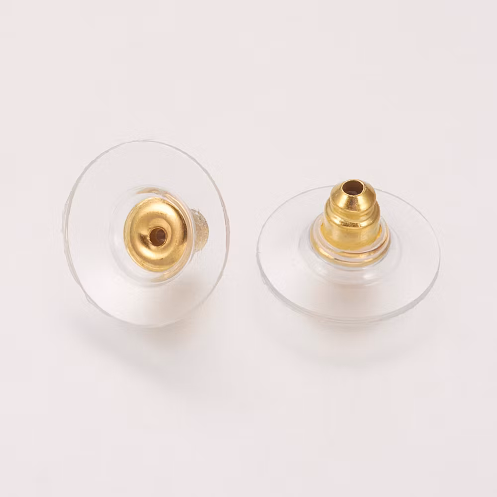 REA: Ear nuts platta guld, ca 10 st