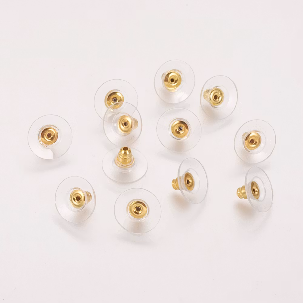 REA: Ear nuts platta guld, ca 10 st