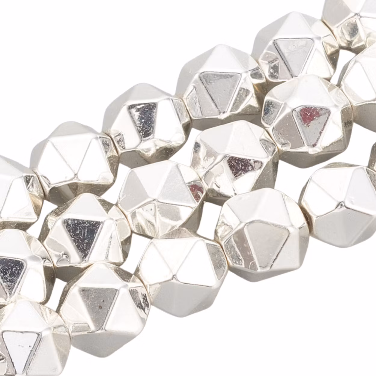 Silverfärgad hematit star cut 6x5 mm, 10 st