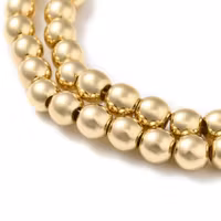 Ljust guldfärgad hematit runda 2 mm, 1 sträng