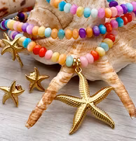 Guldfärgat rostfritt stål örhängen liten snäcka med PVD plätering, 1 par