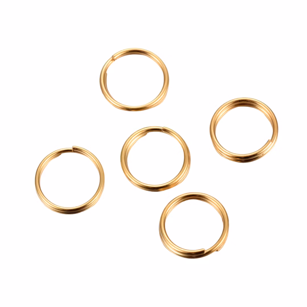 Guldfärgat rostfritt stål dubbelringar 6 mm med PVD plätering, ca 100 st