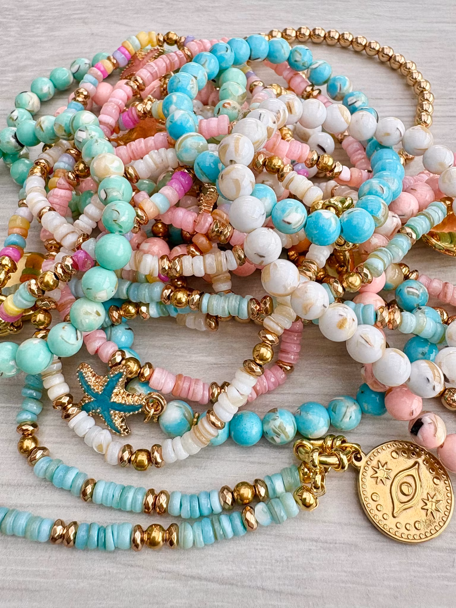 Snäckskalsrondeller 4x2 mm turkosa, 1 sträng