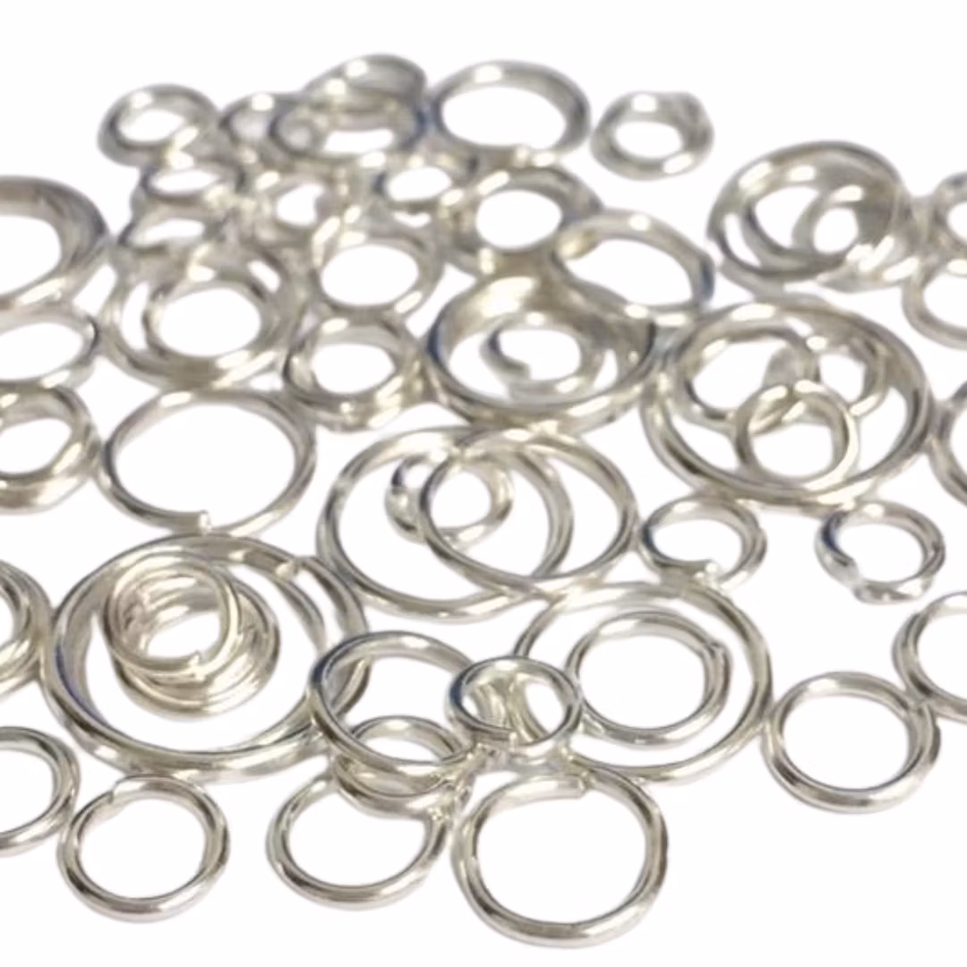 Silverfärgat rostfritt stål bindringar mix, ca 50 st